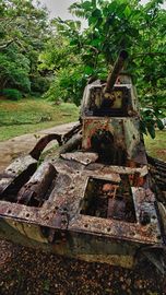 Abandoned tank outside the last Japanese Headquarters in northern Saipan.jpg