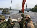 Members of the Italian Army Amphibious Forces (Reggimento Lagunari) and Canadian Army personnel conduct a river crossing in Portugal on 23, 2015 during Trident Juncture 15.jpg