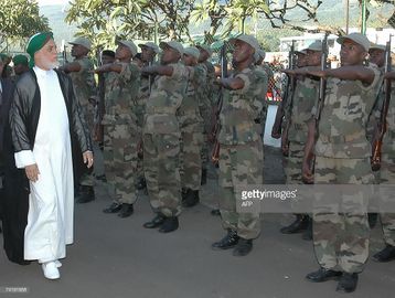 The Head of the Comorian State Mr Ahmed Abdallah Sambi inspects a military parade trained by.jpg