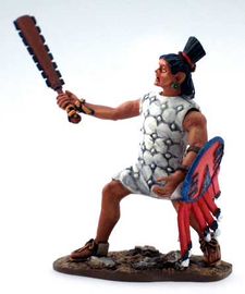 Aztec Attacking with Macuahuitl in Long White Tunic Set 2.jpg