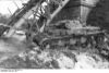 Bundesarchiv_Bild_101I-209-0052-35A,_Russland-Nord,_zerstörte_Brücke_mit_Panzer_IV.jpg