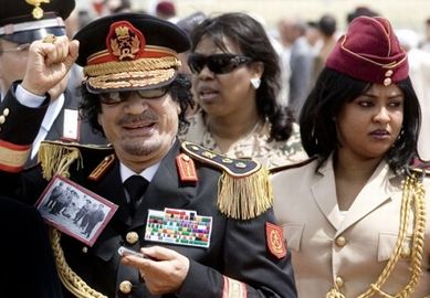 Kaddafi-with-shaddow-4d763fefd5e0a 518x360.jpg