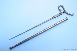 The Fakir's Crutch was an early example of the swordstick. In itself it was unremarkable except for its unusual handle which ensured excellent protection for the user's fingers. The metal sheath was often wielded in the.jpg