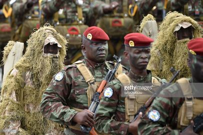 Ivorian soldiers from the Parachute Commando unit parade during celebrations marking the 58th anniversary of Ivory Coast's independence from France on August 7, 2018.jpg