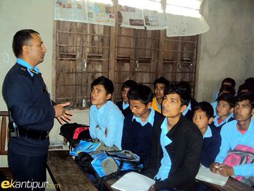 A police man takes a class at a government school in Gorkha on Wednesday..jpg