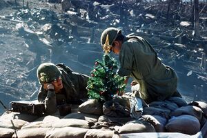 December 25, 1967 Christmas, Vietnam War-US soldiers resting on Hill 875 against bombed forests after the fierce battle of Đắk Tô..jpg