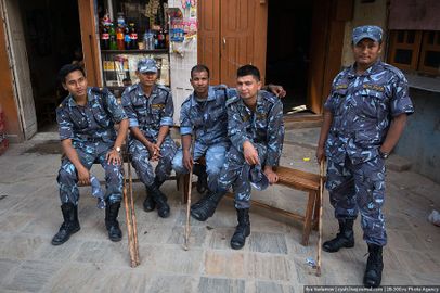 Nepalese police with sticks, Kathmandu.jpg
