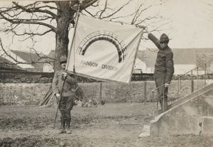 111-SC-6427 - Unfurling the Rainbow Division flag for the first time for the camera - NARA - 55173762.jpg