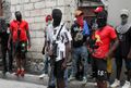 'G9' coalition, is accompanied by Security during a march against Haiti's Prime Minister Ariel Henry, in Port-au-Prince, Haiti September 19, 2023.jpg