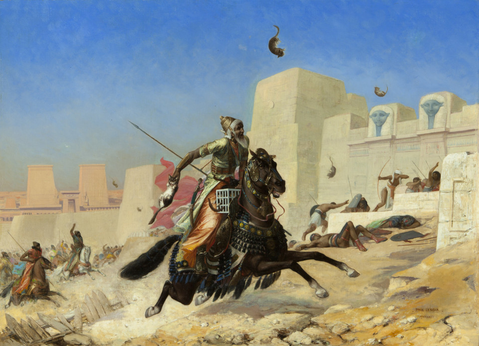 Условное изображение битвы при Пелузии в 525 г. до н. э., когда персидские войска в качестве живых щитов использовали кошек. В действительности, конечно, все было совсем не так, однако картина все-равно достаточно яркая.