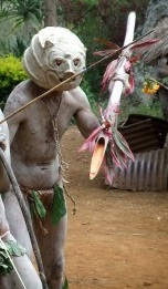 11786131-papua-new-guine8a--september-16-mudmen-warriors-clasp-their-weapons-at-goroka-tribal-festival-papua-n.jpg