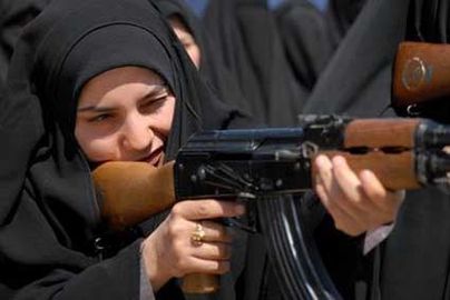 Iranian Sister of Zeynab Female Basij shooting machinegun.jpg