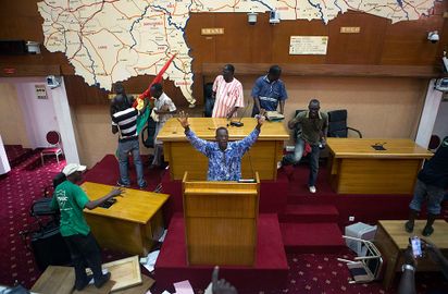 Anti-government protesters take over the parliament building in Ouagadougou, capital of Burkina Faso, October 30, 2014.jpg