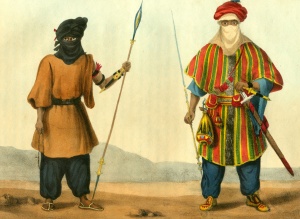 Armed Tuareg men depicted in a French book of 1821. Both men carry spears and the tellak dagger attached to the left forearm, the man on the right (a noble) is also armed with the takouba sword..jpg