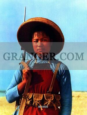 0610505-CHINA-A-female-militia-member-during-the-time-of-the-Great-Leap-Forward-1958-1961-Full-credit-Pictures-from-History--Granger-NYC----All-rights-reserved.jpg