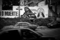 Граффити, на которых Иисус Христос и Богородица изображены с автоматами Калашникова, Каракас, Венесуэла, 2019 г..jpg