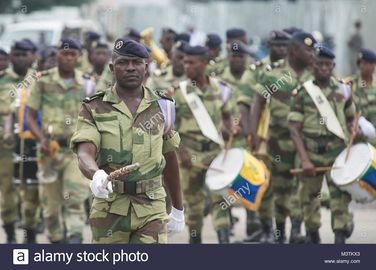 Members-of-the-gabonese-armed-forces-military-band-march-across-a-M3TKX3.jpg