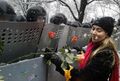 Militsiya and orange flowers, Kiev.jpg