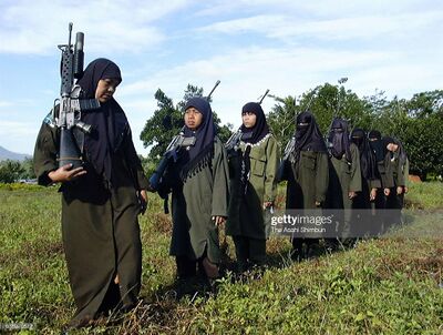 Moro Islamic Liberation Front (MILF) female soldiers line up at their Camp Abubakar on March 25, 2000 in Maguindanao, Philippines.jpg