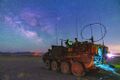 Stryker vehicle during training at Fort Irwin, Calif., as the Milky Way galactic center is visible overhead, May 24, 2022..jpg