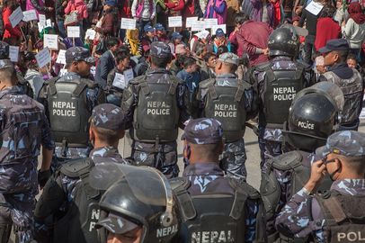 Nepali police forces block demonstrators during a protest near the Constituent Assembly a day ahead of the deadline for a new constitution on January 21, 2015 in Kathmandu, Nepal..jpg