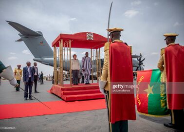 02 May 2019, Burkina Faso, Ouagadougou Federal Chancellor Angela Merkel (CDU) is bid farewell at the airport by the President of Burkina Faso, Roch Marc Kaboré.jpg