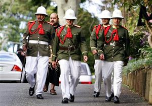 Royal Tongan guards patrol the grounds of the Tongan King Taufa'ahau Tupou IV's New Zealand residency in Auckland on Sept. 12, 2006..jpg