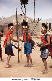 India-nagaland-longwa-konyak-naga-warriors-in-traditional-dress-holding-c7bxaw.jpg