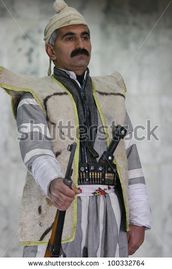 Stock-photo-arbil-kurdistan-january-unidentified-kurdish-soldier-stands-guard-in-kurdistan-parliament-on-100332764.jpg