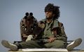 Ливийский повстанец перед наступлением на Айдабию. Ливия. Гражданская война в Ливии. 14 апреля 2011 г..jpg
