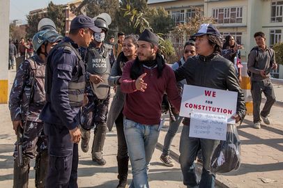 Nepali police forces block access to a group of pro-constitution students a day ahead of the deadline for a new constitution on January 21, 2015 in Kathmandu, Nepal..jpg