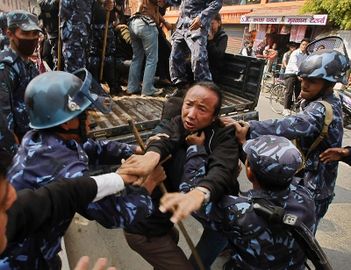 Nepal police detain a Tibetan who was shouting anti-China slogans in tribute to the Tibetans who died in the recent self-immolation, in Katmandu, Nepal, Tuesday, Nov. 1, 2011. 2.jpg