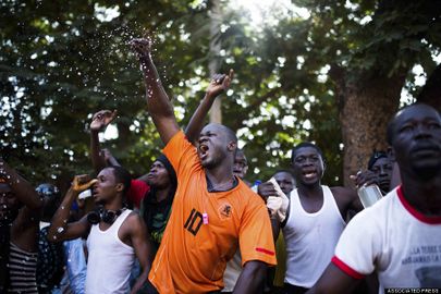 Protesters shout near the parliament building in Burkina Faso, Oct. 30, 2014.jpg