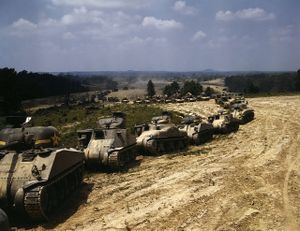 1280px-Parade of M-4 (General Sherman) and M-3 (General Grant) tanks in training maneuvers, Ft Knox.jpg