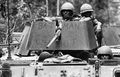 Американские солдаты на бтр M113 с надписью Колесница Бэтмена на пулемётном щитке, Вьетнам.jpg