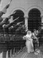 Conclusa la cerimonia nuziale Vito Mussolini e Silvia Tardini de Rosa, escono dalla chiesa di San Giuseppe ricevendo l'omaggio dei moschettieri del duce 03.02.1937.jpg